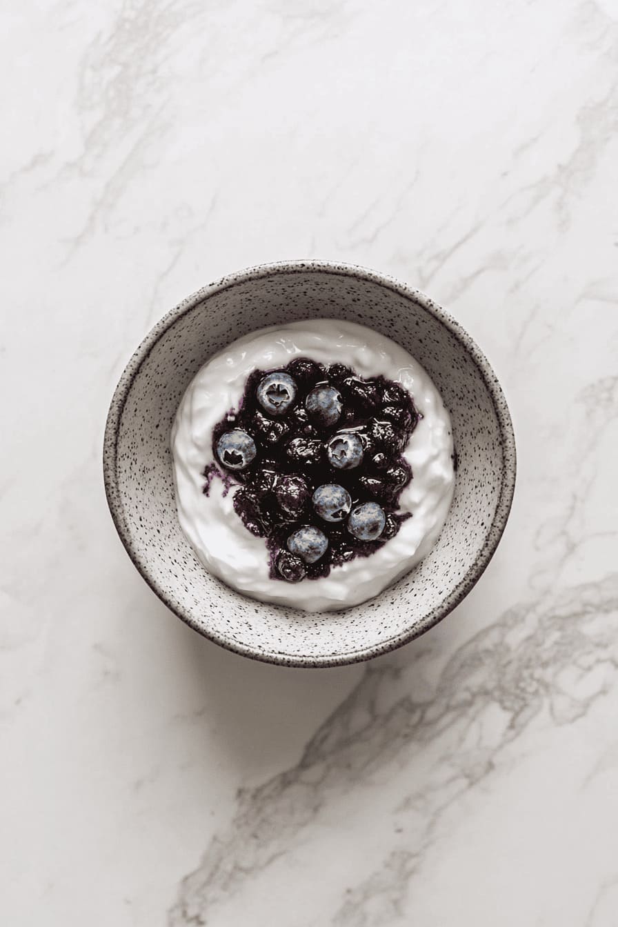 Mixed berry compote with a dollop of Greek yogurt